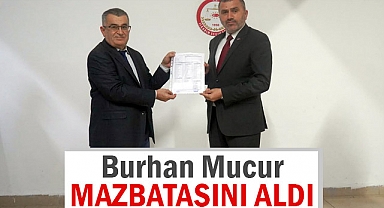 MHP İl Başkanı Burhan Mucur, Mazbatasını Aldı