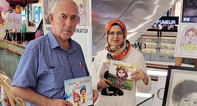 Karikatür sanatçısı Filiz Güldal'a Şair Dursun'dan Ziyaret
